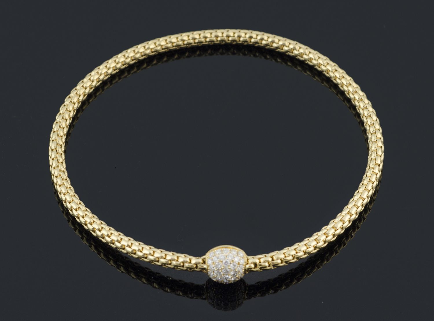 Bracciale Stretch In Oro Giallo A Maglia Tubolare Con Sfera Con