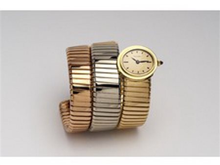 BULGARI - OROLOGIO/BRACCIALE IN ORO TRE COLORI, ANNI '60 bracciale a tre giri...