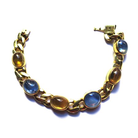 BULGARI - BRACCIALE IN ORO E ZAFFIRI, ANNI '70 decorato con zaffiri blu e...