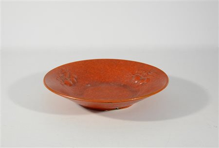 Angelo Biancini (1911- 1988) * Piatto in ceramica smaltata in rosso decorato...