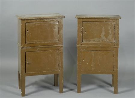 Due comodini in legno dipinto a due sportelli,cm. 82x47x28,5.