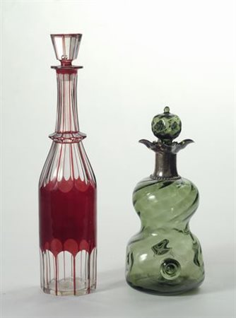 Due bottiglie in vetro e cristallo colorato, XX sec.