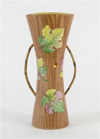 Rometti: vaso in ceramica policroma con decori floreali con manici laterali....