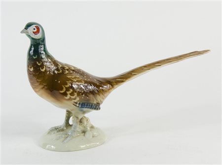 Royal Dux: uccello in porcellana policroma. Marcato sotto la base. Lung. cm. 33.