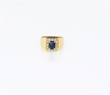 Anello in oro giallo modello Chevalier con zaffiro e brillanti huit-huit, g 5,50