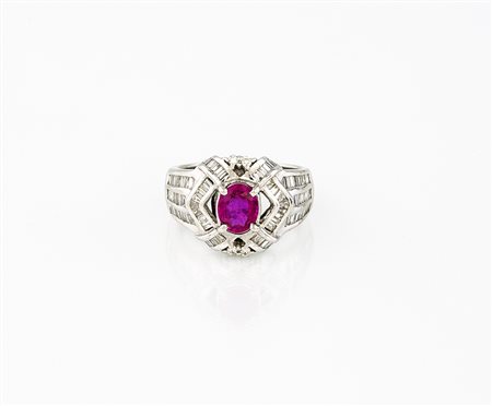 Anello con rubino rosso vivido, ct 1,70 circa e brillanti ct 2,00 circa g...