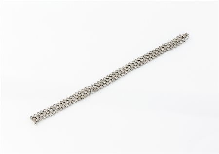 Bracciale con tre file di brillanti, ct 4,00 circa, g 28,70.