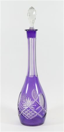 Grande bottiglia in cristallo viola con tappo. H. cm. 52.