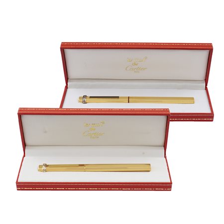 Cartier, Le Must Vendome Francia l. 13,5 cm. coppia di penne stilografiche...