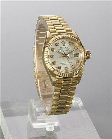 ROLEX Oyster Perpetual Day Just, anni '70 Diam 26 Cassa in oro giallo, in tre...