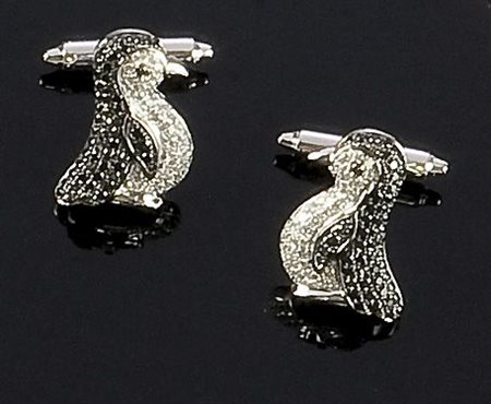 GEMELLI Coppia di gemelli in oro bianco a forma di pinguino con diamanti...