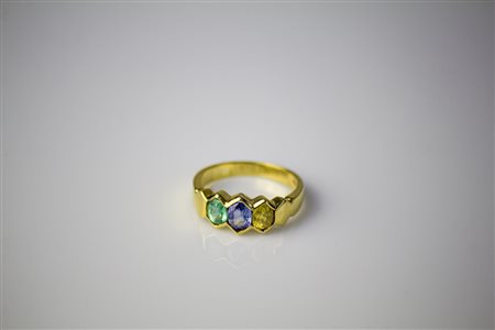 Anello in oro giallo 18kt, gr 4.90, con tormaline e topazio. . . [Nessun...