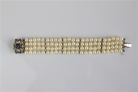 Bracciale a quattro fili di perle 6,8mm con barrette e chiusure in oro...