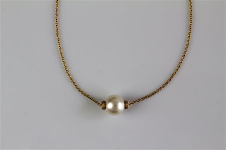 Collana in oro rosso 18kt, con perla australiana 13.6mm. Diamanti 0.22. . ....