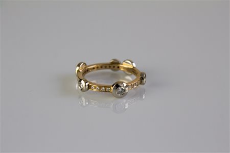 Anello in oro rosa e bianco 18kt, gr 3,49. Diamanti cts 0.57. . . [Nessun...