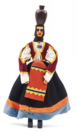 EUGENIO TAVOLARAUna figura femminile con costume tradizionale sardo, circa...