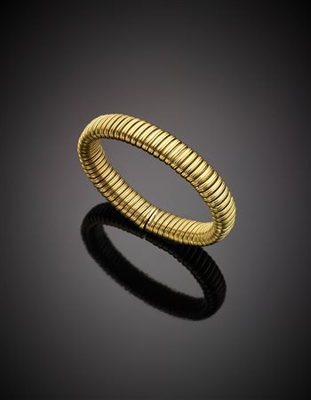 Bracciale elastico a tubogas in oro giallo, g 53,14, diam. cm 6.Yellow gold...