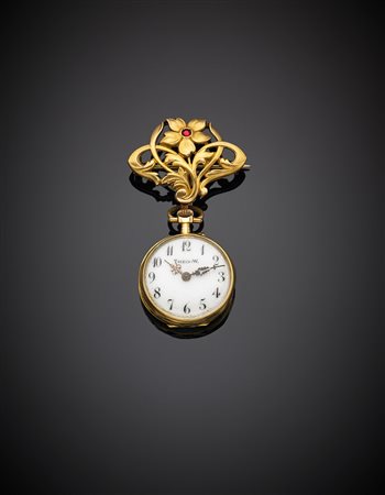 Spilla a fiore con orologio tutto in oro giallo rifinito con diamante a mezza...