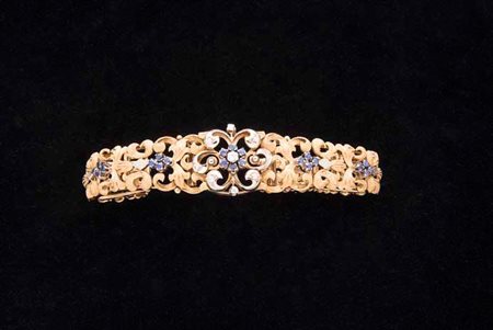 Bracciale in oro giallo e bianco con n. 9 brillanti del peso complessivo di...