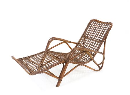 Chaise longue in rattan. Esecuzione italiana, anni 60 (cm 70x78x165) (difetti)