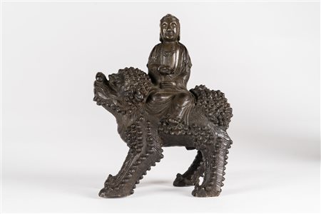 Arte Cinese Fusione in bronzo a patina scura raffigurante Wenshu su leone...