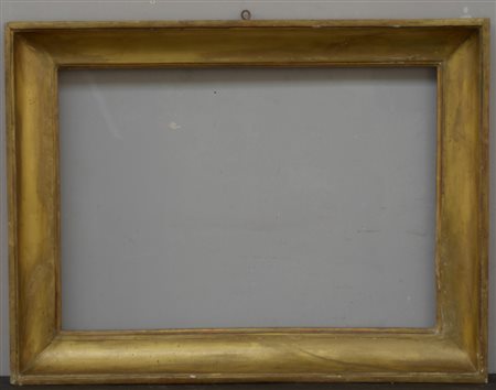 Cornice di forma rettangolare in legno dorato sec XIX (cm 72x51)(difetti)