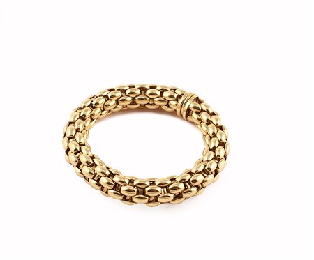 Bracciale in oro giallo 18kt a maglie intrecciate, gr. 50,2.