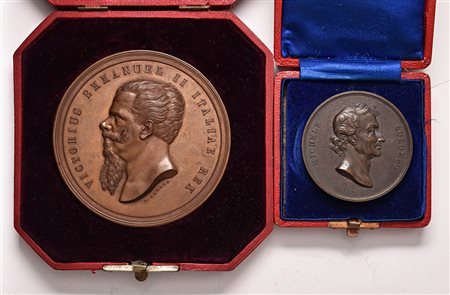 Una medaglia di Vittorio Emanuele II (1875) e una di Michele Colombo (1838)....