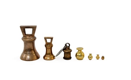 Lotto composto da sette pesi in ottone-ENSeven brass weights