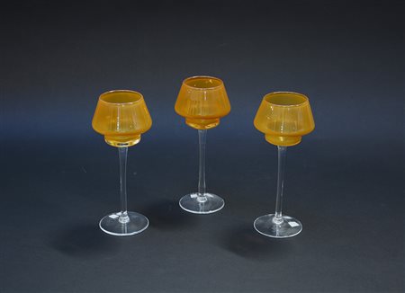 Tre calici porta candele in vetro con coppa color ambra (h cm 20)