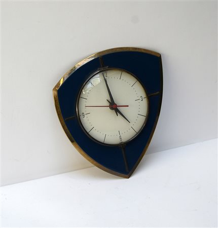 Orologio in lamina di ottone laccato blu. Anni '60.