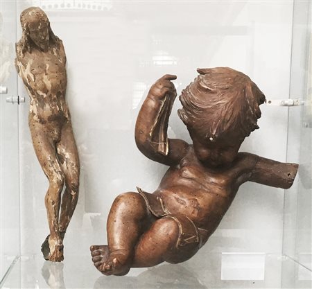 Lotto composto da una scultura il legno intagliato del secolo XIX...