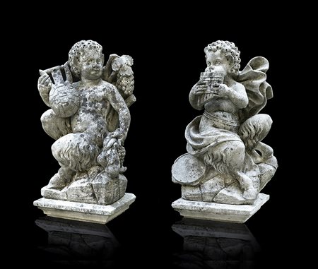Coppia di antiche sculture da giardino in pietra raffiguranti satiri...
