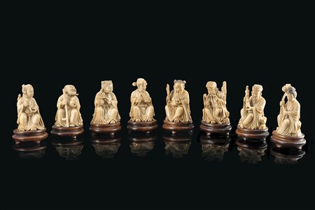 Otto sculture in avorio raffiguranti Immortali taoisti, basi in legno...