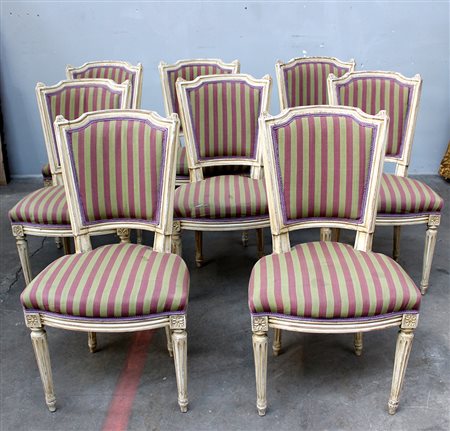 Gruppo di otto sedie in stile Luigi XVI in legno laccato e seduta a righe...
