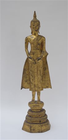Scultura in bronzo dorato raffigurante buddha stante (lievi...