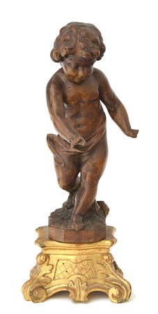 Arte del secolo XIX. Scultura in legno raffigurante putto poggiante su base...