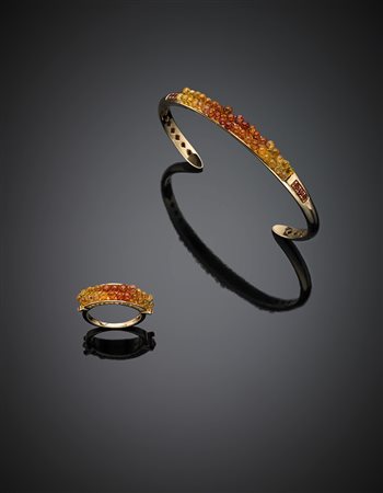 *DI GREGORIODemi-parure composto da bracciale alla schiava e anello in oro...