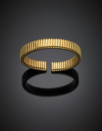 WEINGRILLBracciale alla schiava tubogas in oro giallo g 43, diam. cm 5,5....