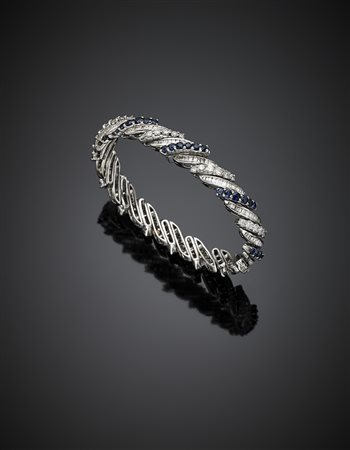 Bracciale modulare in oro bianco, diamanti per complessivi ct. 5,50 circa e...