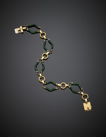 Bracciale a catena in oro giallo in parte cesellato e smalto verde, g 30,76,...