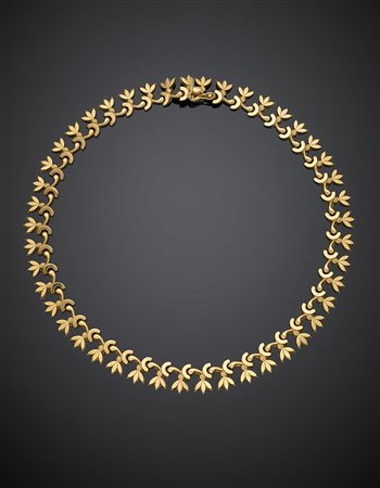 Collier modulare in oro giallo rossastro, g 28,48, lungh. cm 40 circa....