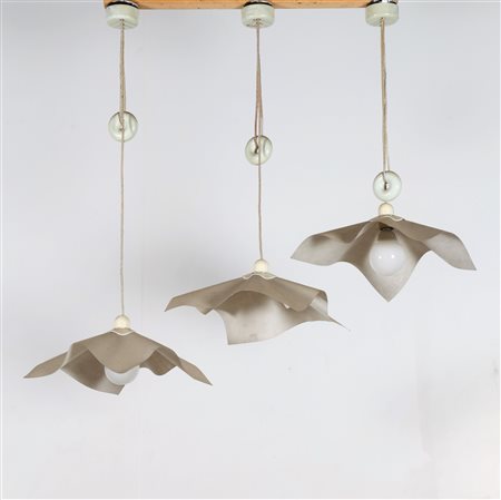 BELLINI MARIO (n. 1935) Tre lampade da soffitto mod. Area. Metallo e cocoon....