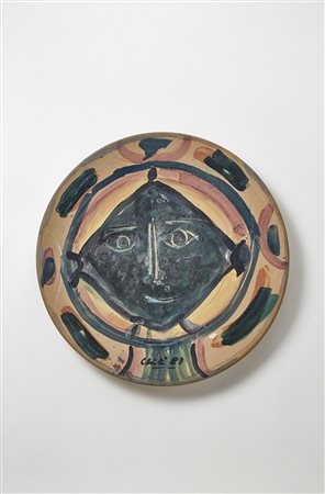 Guido Chiti (Gerreti Guidi 1918 - Genova 2003)Piatto in ceramica decorata in...