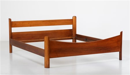 CACCIA DOMINIONI LUIGI (n. 1913) Letto. Legno di noce. Cm 175,00 x 80,00 x...