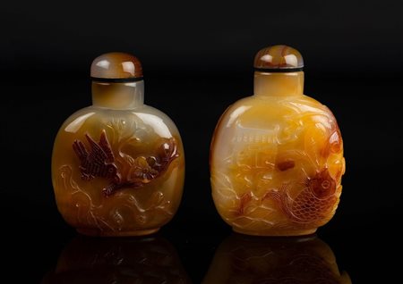 Arte Cinese  Two agate snuff bottles carved with fishes and birds .