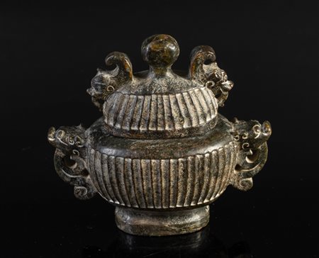 Arte Cinese  A stone lidded container with zoomorphic handles China, 20th century .