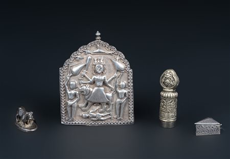 Arte Cinese  A group of four silver itemsVarious provenances, 19th century .