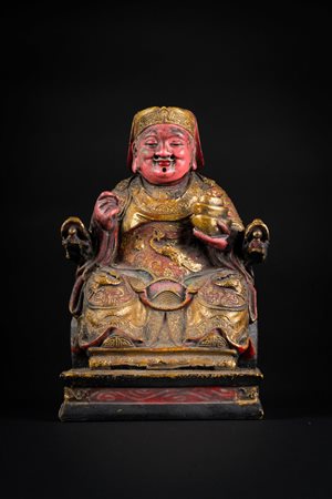 Arte Cinese  A gilt lacquered wooden statue of a Taoist seated figureChina, Qing dynasty, 18th-19th century .
