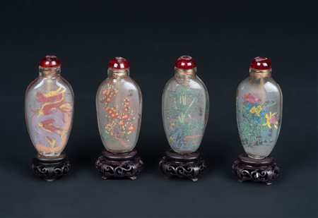 Arte Cinese  A group of four reverse painted glass snuff bottles China, 20th century .